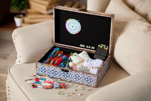 casket for needlework with flower, sewing in style interior