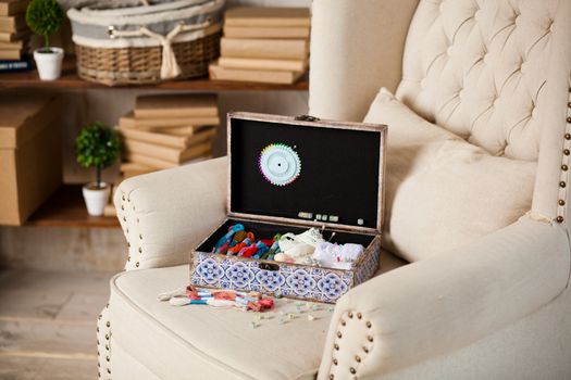 casket for needlework with flower, sewing in style interior