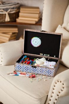casket for needlework with flower, sewing in style interior