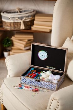 casket for needlework with flower, sewing in style interior