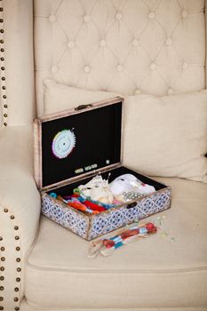 casket for needlework with flower, sewing in style interior