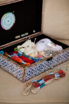 casket for needlework with flower, sewing in style interior