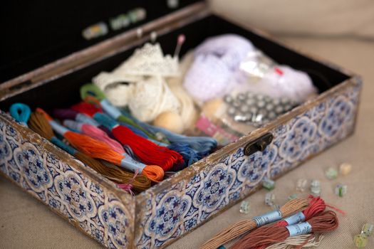 casket for needlework with flower, sewing in style interior