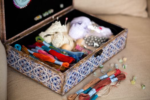 casket for needlework with flower, sewing in style interior