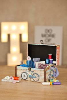 casket for needlework with flower, sewing in style interior