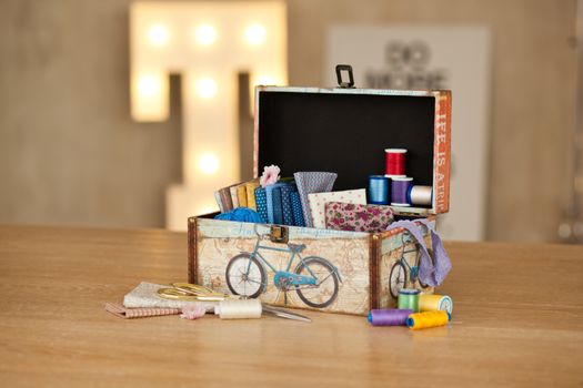 casket for needlework with flower, sewing in style interior