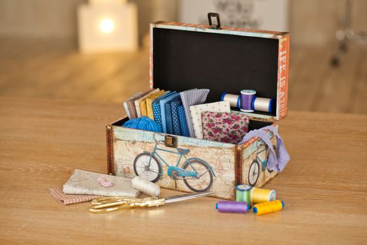 casket for needlework with flower, sewing in style interior