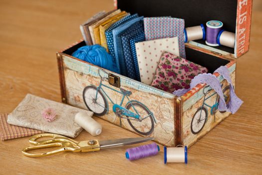 casket for needlework with flower, sewing in style interior