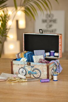 casket for needlework with flower, sewing in style interior
