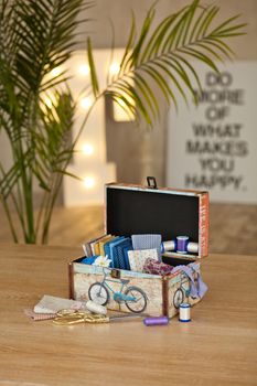 casket for needlework with flower, sewing in style interior