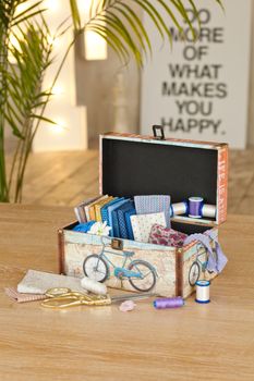 casket for needlework with flower, sewing in style interior