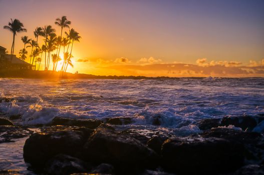 The sunrise over the beach in Kauai, Hawaii