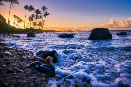 The sunrise over the beach in Kauai, Hawaii