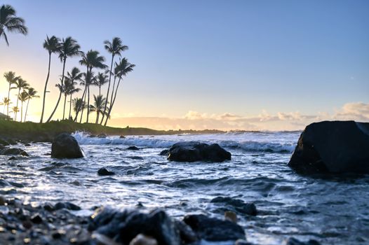 The sunrise over the beach in Kauai, Hawaii