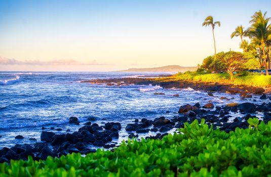 The sunrise over the beach in Kauai, Hawaii