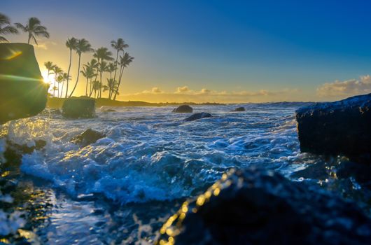 The sunrise over the beach in Kauai, Hawaii