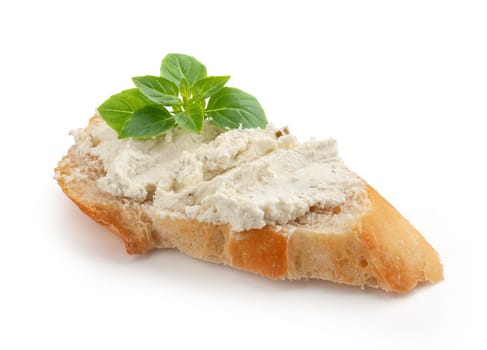 Sandwich with soft cottage cheese and fresh green basil