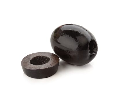 Isolated slices of black olives on the white background