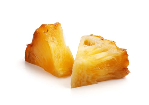 Two isolated fresh segment of pineapple on the white background