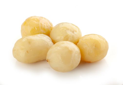 Isolated heap of boiled potatoes on the white background