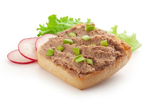 Isolated sandwich with meat pate, green onion, radish and lettuce
