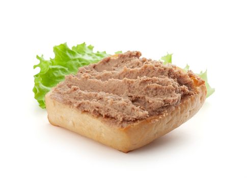 Isolated sandwich with meat pate and fresh lettuce