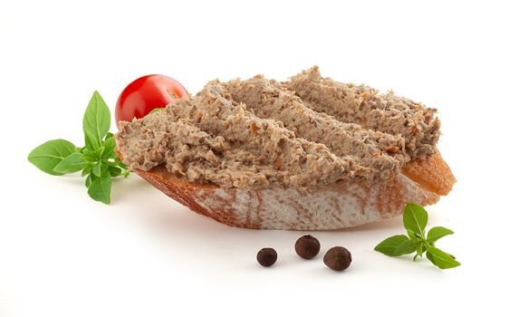 Sandwich with meat pate, tomato, basil and black pepper