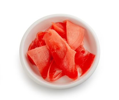 Isolated red pickled ginger in the white bowl