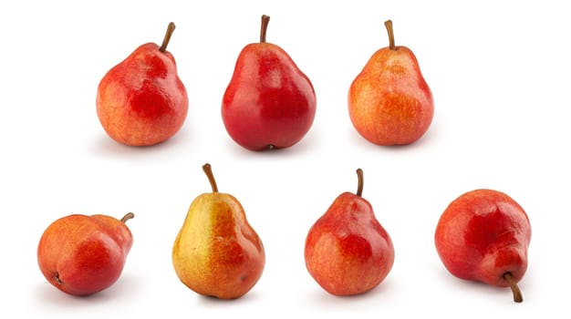 Assorted red pears on the white background