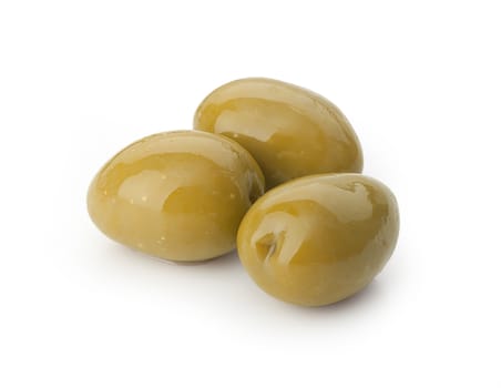 Three marinated green olives on the white background