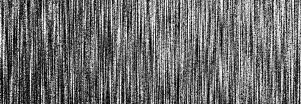 Gray monochrome metal texture with white scratches. Abstract noise black background overlay for design. Art stylized baner.