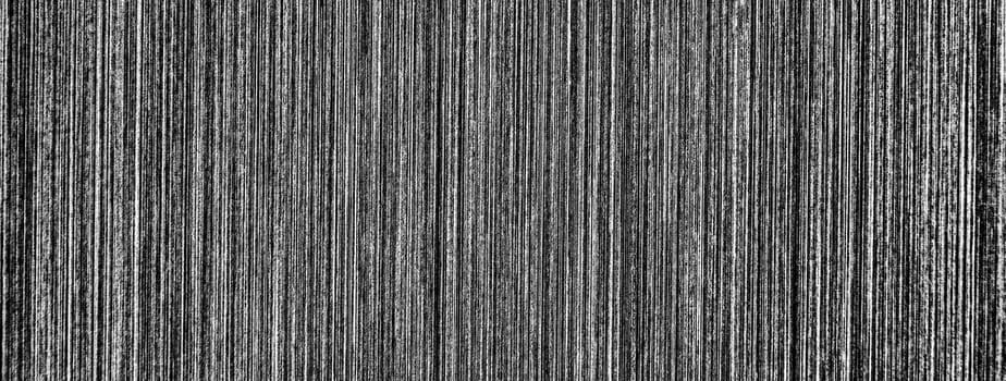 Gray monochrome metal texture with white scratches. Abstract noise black background overlay for design. Art stylized baner.