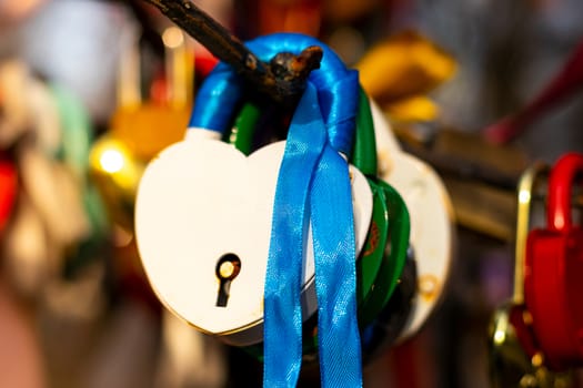 Many wedding colorful locks on a wedding tree. Symbol of love, marriage and happiness.