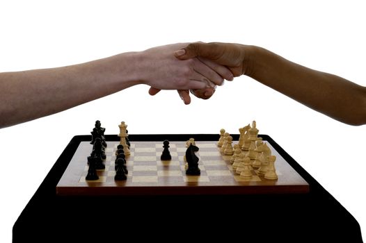 Two female chess players shaking hands