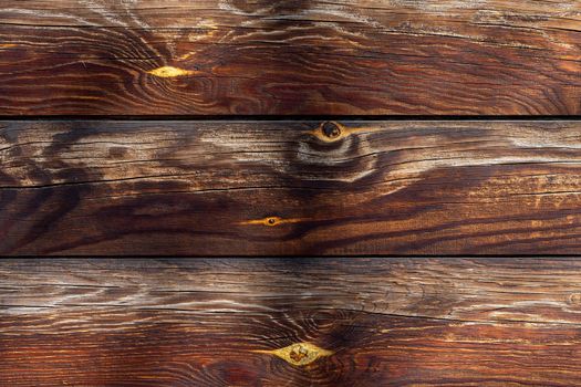 old wooden wall with logs