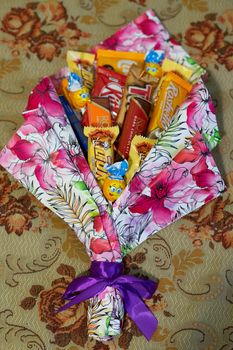 colorful bouquet of delicious candies and chocolates
