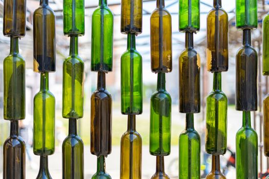 empty glass bottles as decor and second life for waste