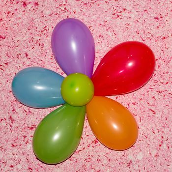 Merry colorful flower with balloons