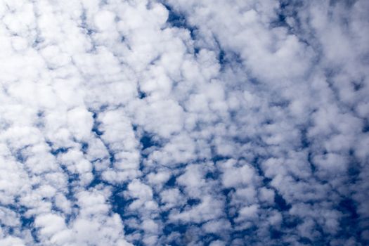 blue sky with many small white shards