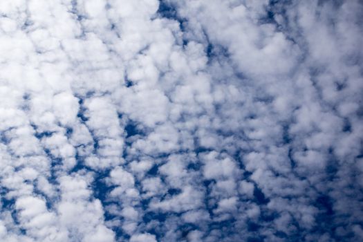 blue sky with many small white shards