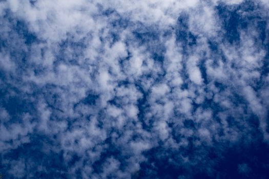 blue sky with many small white shards