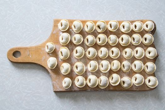 dumplings on a plate ready for cooking