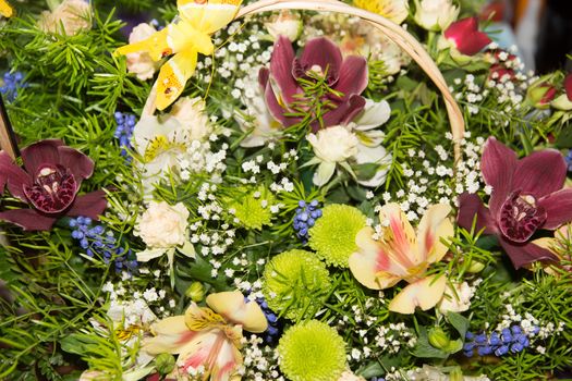 colorful bouquet of fresh flowers in basket