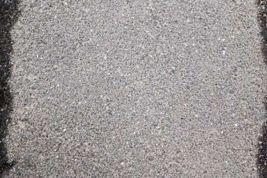 Gray asphalt with fine gravel