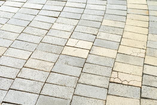 The gray cobblestones are lined with an interesting pattern