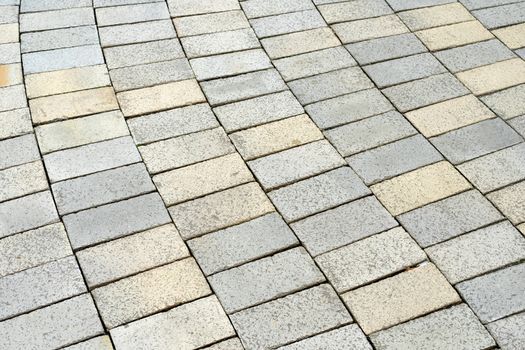 The gray cobblestones are lined with an interesting pattern