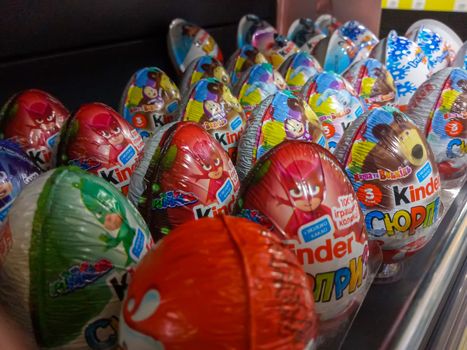 Vinnytsia Ukraine May 15, 2020  Multicolored kinder surprises lie on the shelf