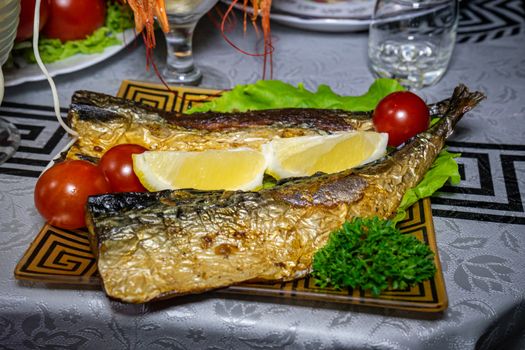 Baked mackerel with tomatoes and lemon