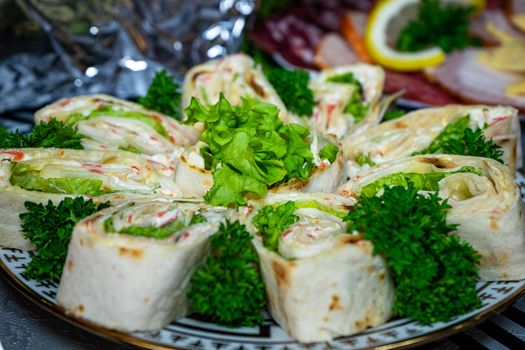 Pita bread with cheese and seafood on a plate decorated with parsley