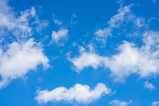bright blue sky with white small clouds